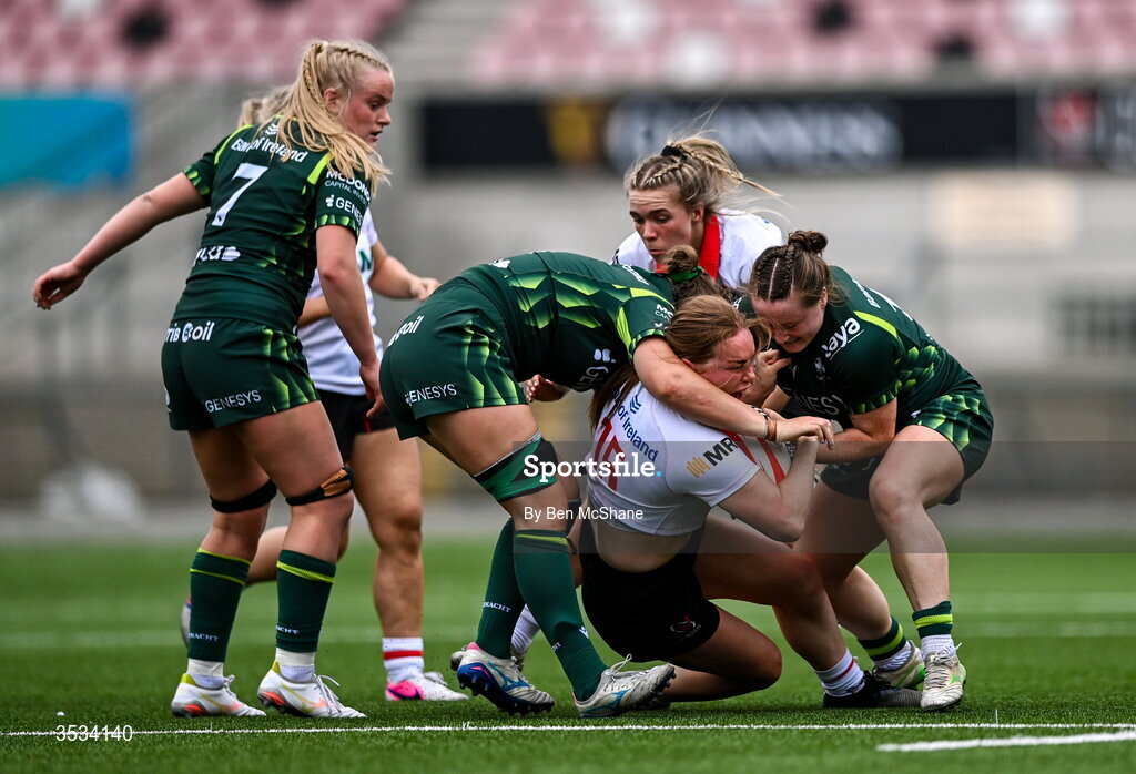 8 August 2026; Niamh Marley of Ulster is tackled by Jemima Adams Verling, left, and Meabh Deely of Connacht during the Vodafone Womens Interprovincial Championship Round 1 match between Ulster and Connacht at Affidea Stadium in Belfast. Photo by Ben McShane/Sportsfile