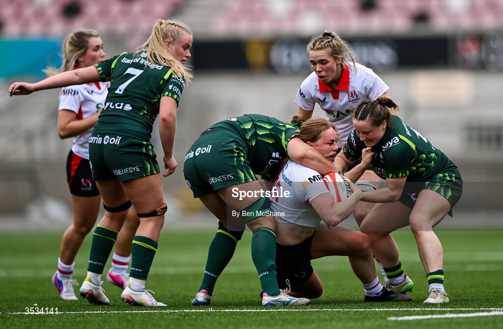 8 August 2026; Niamh Marley of Ulster is tackled by Jemima Adams Verling, left, and Meabh Deely of Connacht during the Vodafone Womens Interprovincial Championship Round 1 match between Ulster and Connacht at Affidea Stadium in Belfast. Photo by Ben McShane/Sportsfile