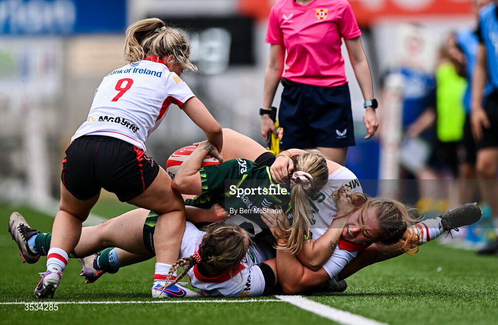 8 August 2026; Emma Kelly of Connacht is pulled to touch by Ulster players, from left, Rachael McIlroy, Katie Hetherington and Sarah Roberts during the Vodafone Womens Interprovincial Championship Round 1 match between Ulster and Connacht at Affidea Stadium in Belfast. Photo by Ben McShane/Sportsfile