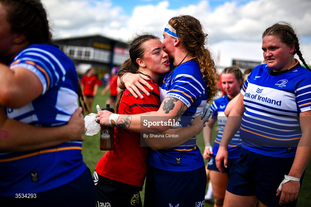 8 August 2026; Ruth Campbell of Leinster, right, hugs Maeve Óg O'Leary of Munster after the Vodafone Womens Interprovincial Championship Round 1 match between Munster and Leinster at Virgin Media Park in Cork. Photo by Shauna Clinton/Sportsfile