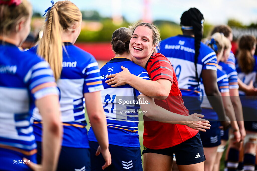 8 August 2026; Alana McInerney of Munster with Leinster players after the Vodafone Womens Interprovincial Championship Round 1 match between Munster and Leinster at Virgin Media Park in Cork. Photo by Shauna Clinton/Sportsfile
