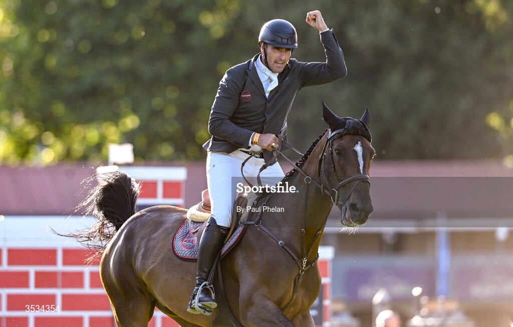 8 August 2026; Derek Mccoppin of Ireland, celebrates a jump, competing on Explosief's Legacy in the Defender Puissance during day four of the Gallagher Dublin Horse Show at the RDS in Dublin. Photo by Paul Phelan/Sportsfile