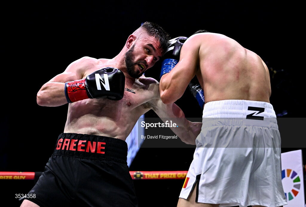 8 August 2026; Louis Greene, left, and Daniel Buciuc during their middleweight bout during the Zuffa Boxing 10 event at the 3Arena in Dublin. Photo by David Fitzgerald/Sportsfile