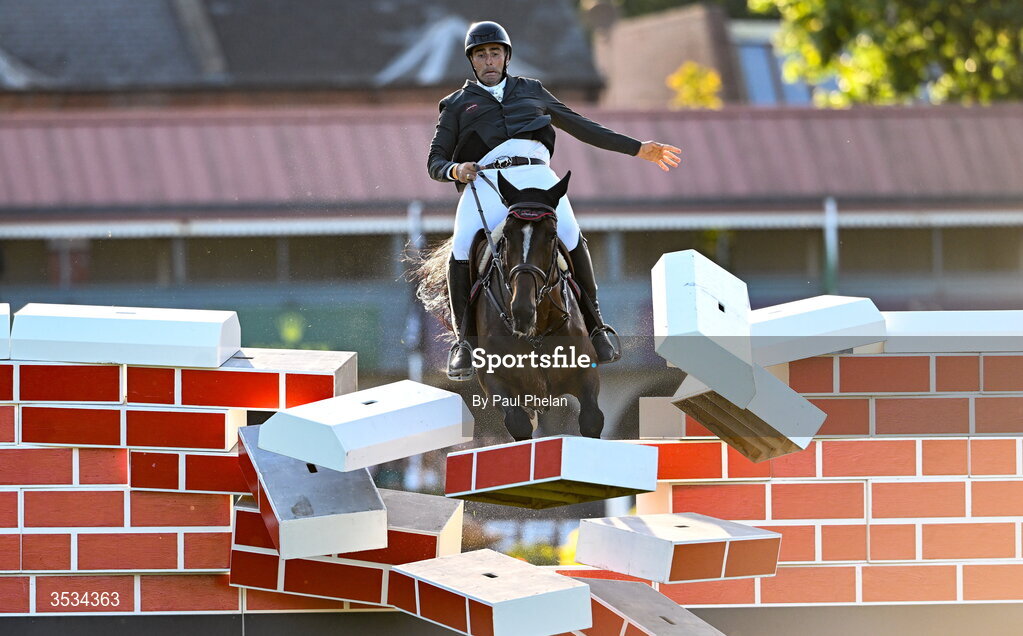 8 August 2026; Derek Mccoppin of Ireland, crashes into the wall in the last round, competing on Explosief's Legacy in the Defender Puissance during day four of the Gallagher Dublin Horse Show at the RDS in Dublin. Photo by Paul Phelan/Sportsfile