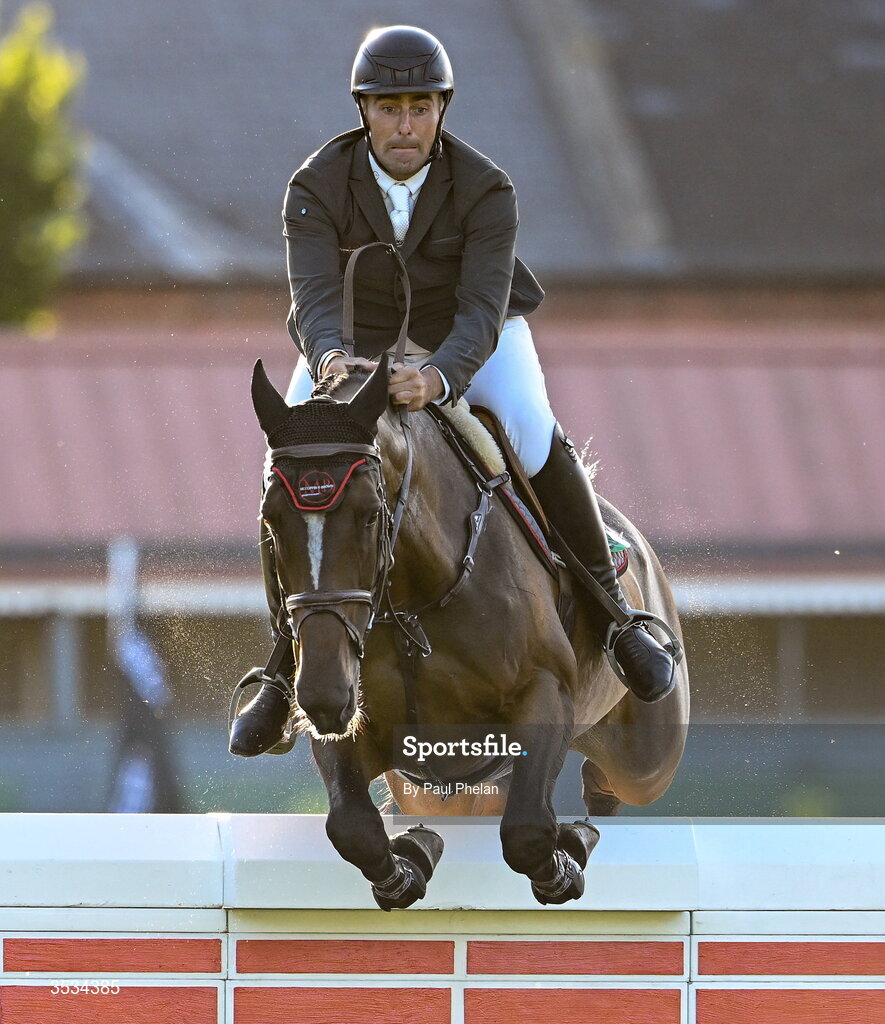 8 August 2026; Derek Mccoppin of Ireland, completes a jump, competing on Explosief's Legacy in the Defender Puissance during day four of the Gallagher Dublin Horse Show at the RDS in Dublin. Photo by Paul Phelan/Sportsfile