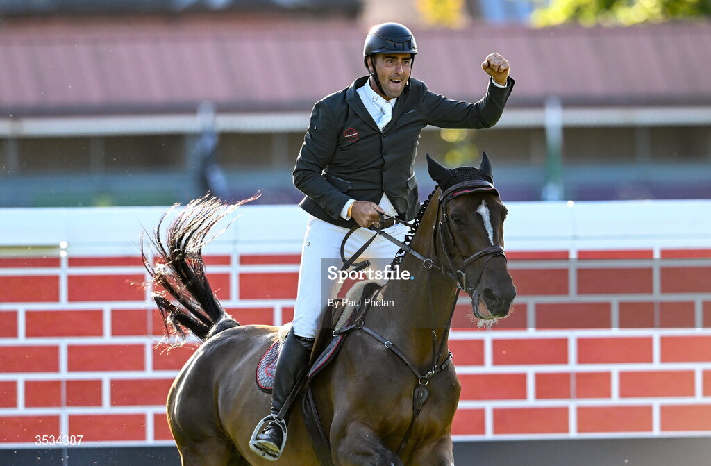 8 August 2026; Derek Mccoppin of Ireland, celebrates a jump, competing on Explosief's Legacy in the Defender Puissance during day four of the Gallagher Dublin Horse Show at the RDS in Dublin. Photo by Paul Phelan/Sportsfile