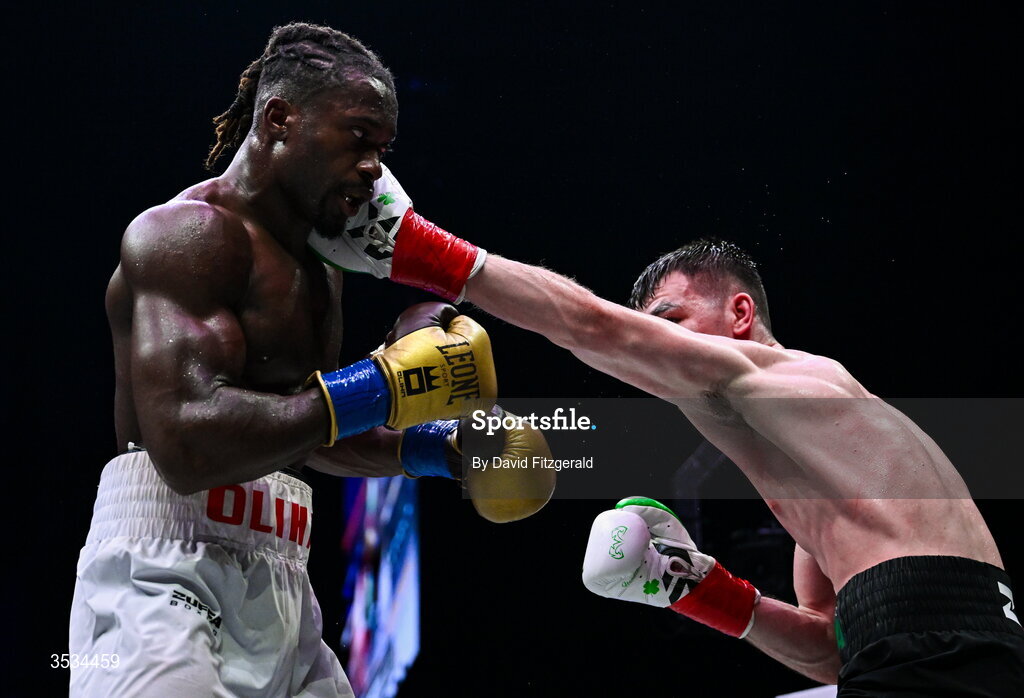 8 August 2026; Etinosa Oliha, left, and Aaron McKenna during their world middleweight title bout during the Zuffa Boxing 10 event at the 3Arena in Dublin. Photo by David Fitzgerald/Sportsfile