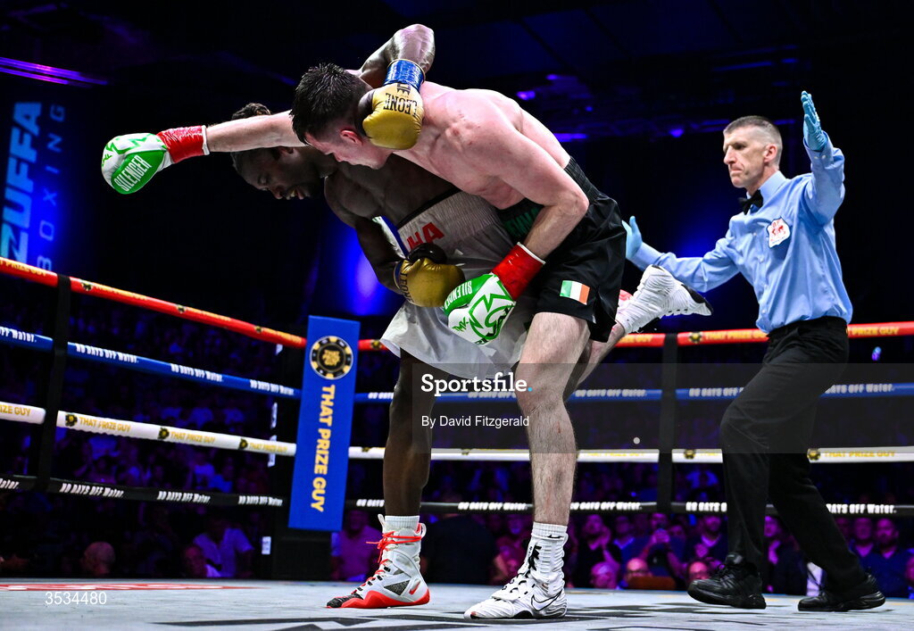 8 August 2026; Etinosa Oliha, left, and Aaron McKenna during their world middleweight title bout during the Zuffa Boxing 10 event at the 3Arena in Dublin. Photo by David Fitzgerald/Sportsfile