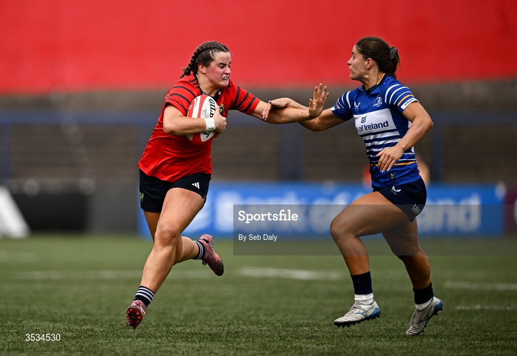 8 August 2026; Katie Corrigan of Munster in action against Vicky Elmes of Leinster during the Vodafone Womens Interprovincial Championship Round 1 match between Munster and Leinster at Virgin Media Park in Cork. Photo by Seb Daly/Sportsfile