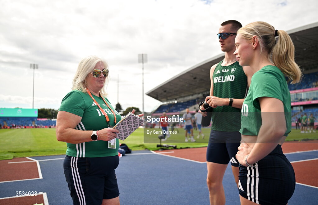 9 August 2026; Athletics Ireland Operational Team Manager Teresa McDaid, speaks with Jack Raftery and Lauren Roy during a training session ahead of the European Athletics Championships 2026 at Alexander Stadium in Birmingham, England. Photo by Sam Barnes/Sportsfile