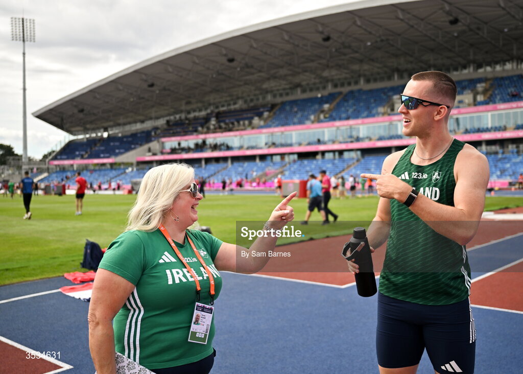 9 August 2026; Athletics Ireland Operational Team Manager Teresa McDaid, shares a joke with Jack Raftery during a training session ahead of the European Athletics Championships 2026 at Alexander Stadium in Birmingham, England. Photo by Sam Barnes/Sportsfile