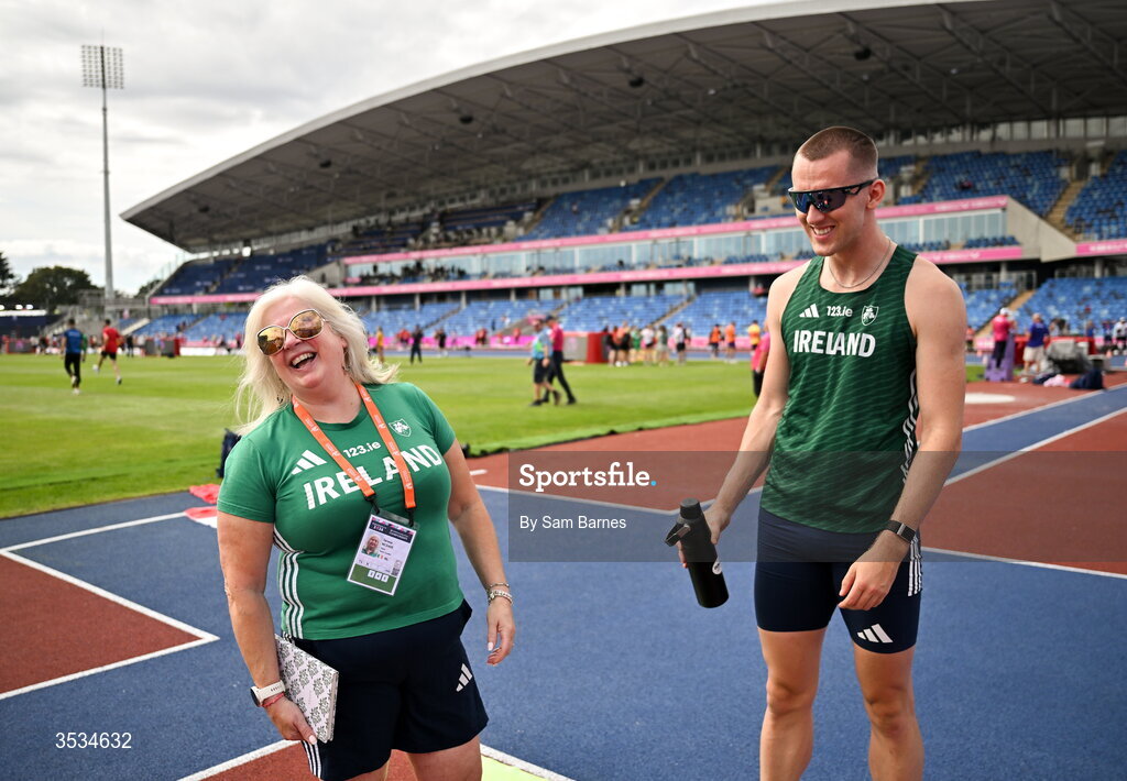 9 August 2026; Athletics Ireland Operational Team Manager Teresa McDaid, shares a joke with Jack Raftery during a training session ahead of the European Athletics Championships 2026 at Alexander Stadium in Birmingham, England. Photo by Sam Barnes/Sportsfile