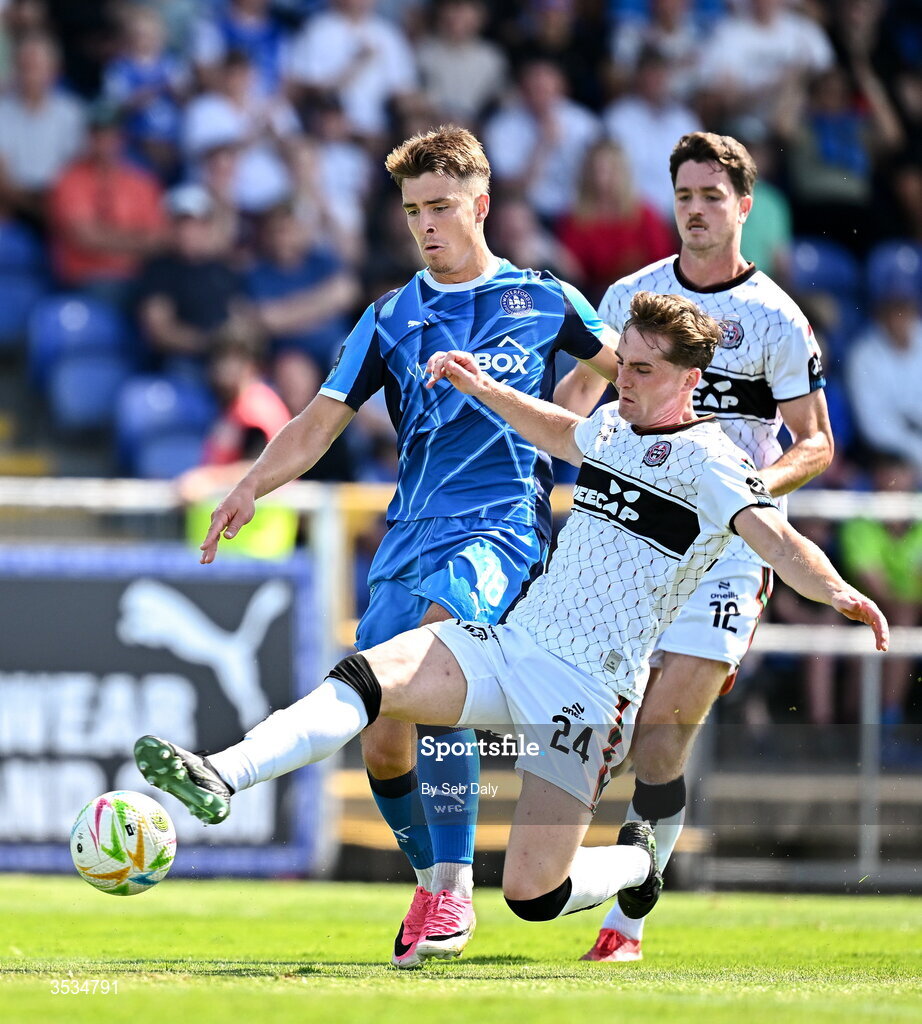 9 August 2026; Tommy Lonergan of Waterford is tackled by Cian Byrne of Bohemians during the SSE Airtricity Men's Premier Division match between Waterford and Bohemians at the RSC in Waterford. Photo by Seb Daly/Sportsfile