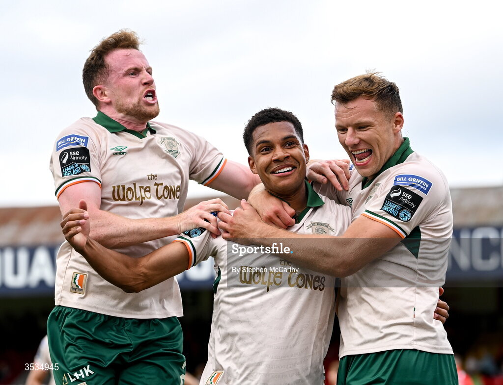 9 August 2026; Anthony Olusanya of St Patrick's Athletic celebrates with team-mates Sean Hoare, left, and Jamie Lennon, right, after scoring his side's first goal during the SSE Airtricity Men’s Premier Division match between Shelbourne and St Patrick's Athletic at Tolka Park in Dublin. Photo by Stephen McCarthy/Sportsfile