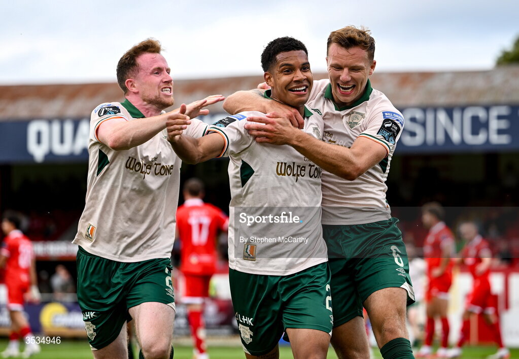 9 August 2026; Anthony Olusanya of St Patrick's Athletic celebrates with team-mates Sean Hoare, left, and Jamie Lennon, right, after scoring his side's first goal during the SSE Airtricity Men’s Premier Division match between Shelbourne and St Patrick's Athletic at Tolka Park in Dublin. Photo by Stephen McCarthy/Sportsfile