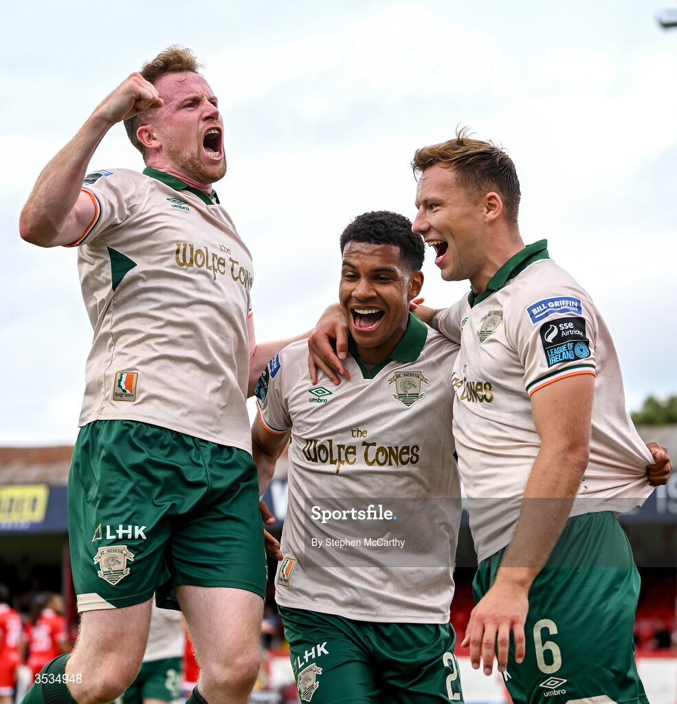 9 August 2026; Anthony Olusanya of St Patrick's Athletic celebrates with team-mates Sean Hoare, left, and Jamie Lennon, right, after scoring his side's first goal during the SSE Airtricity Men’s Premier Division match between Shelbourne and St Patrick's Athletic at Tolka Park in Dublin. Photo by Stephen McCarthy/Sportsfile