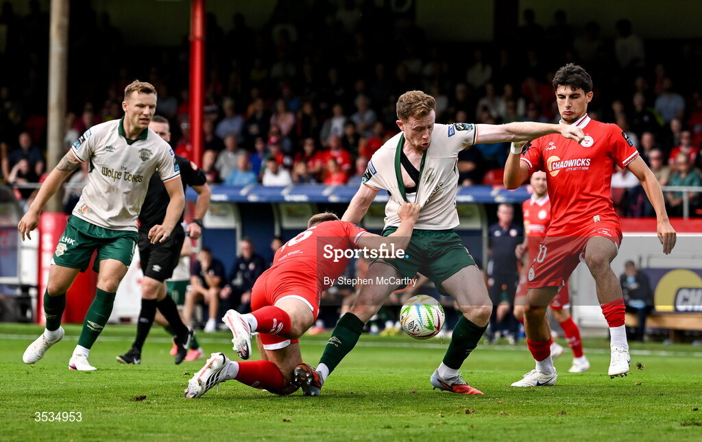 9 August 2026; Sean Hoare of St Patrick's Athletic is tackled by Odhrán Casey of Shelbourne during the SSE Airtricity Men’s Premier Division match between Shelbourne and St Patrick's Athletic at Tolka Park in Dublin. Photo by Stephen McCarthy/Sportsfile