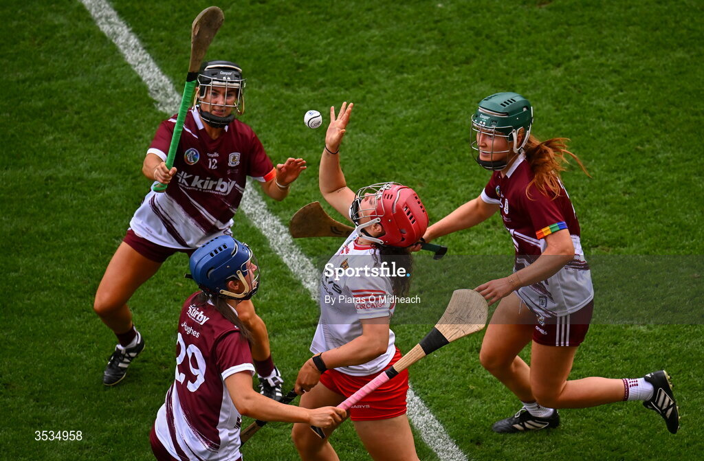 9 August 2026; Sorcha McCartan of Cork in action against Galway players Jennifer Hughes, 29, Aoife Donohue, 12, and Róisín Black, right, during the Glen Dimplex All-Ireland Senior Camogie Championship final match between Galway and Cork at Croke Park in Dublin. Photo by Piaras Ó Mídheach/Sportsfile