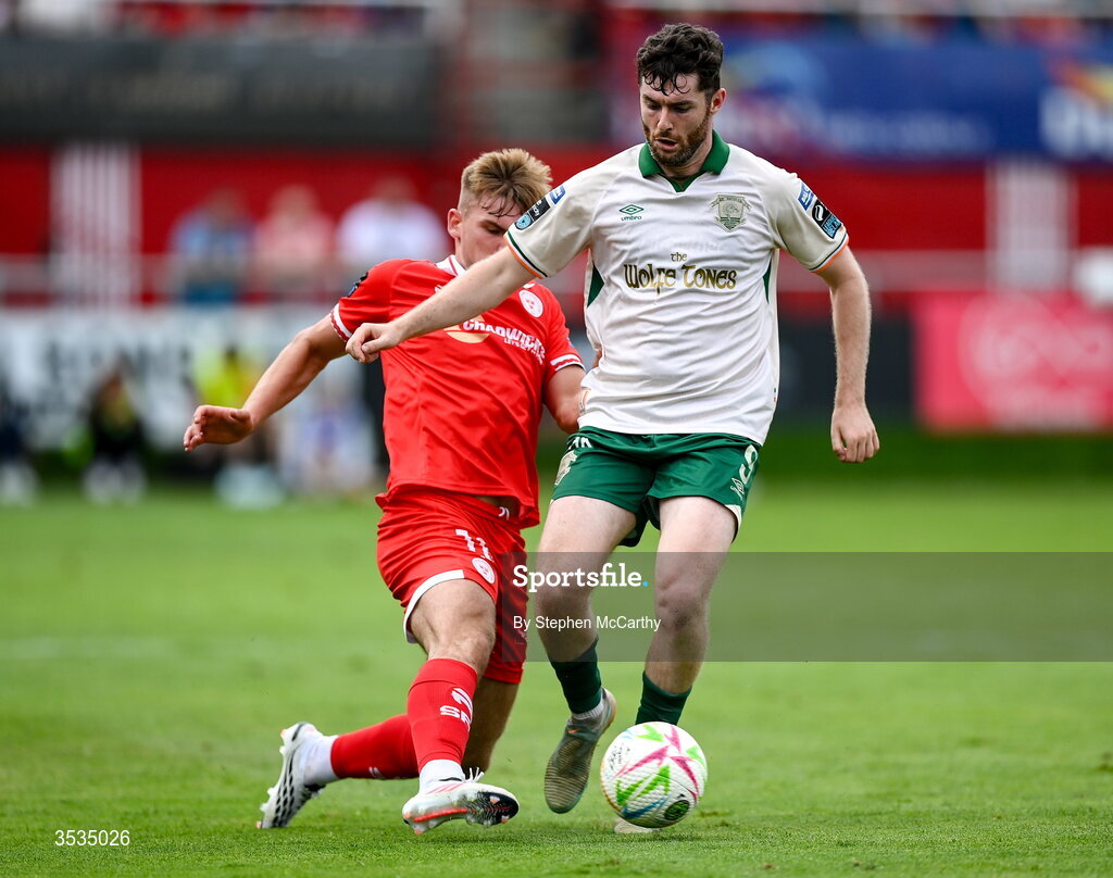 9 August 2026; Aidan Keena of St Patrick's Athletic is tackled by Odhrán Casey of Shelbourne during the SSE Airtricity Men’s Premier Division match between Shelbourne and St Patrick's Athletic at Tolka Park in Dublin. Photo by Stephen McCarthy/Sportsfile