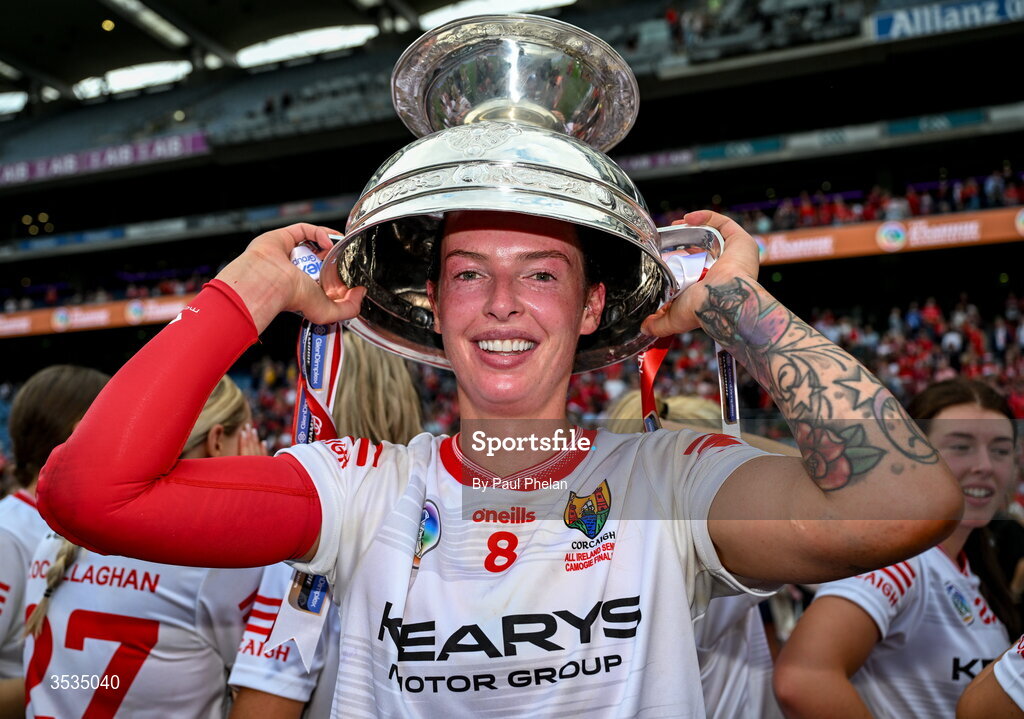 9 August 2026; Ashling Thompson of Cork weare the O'Duffy Cup as a hat after her side's victory Glen Dimplex All-Ireland Senior Camogie Championship final match between Galway and Cork at Croke Park in Dublin. Photo by Paul Phelan/Sportsfile