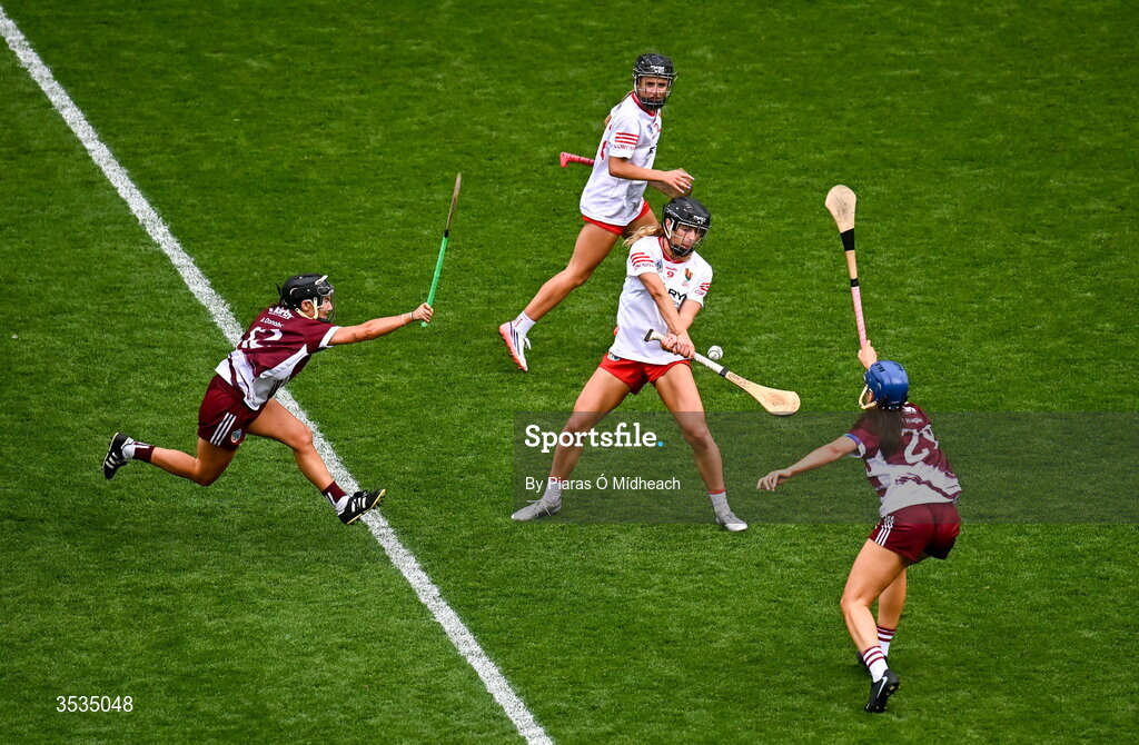 9 August 2026; Laura Hayes of Cork in action against Aoife Donohue and Jennifer Hughes, right, of Galway during the Glen Dimplex All-Ireland Senior Camogie Championship final match between Galway and Cork at Croke Park in Dublin. Photo by Piaras Ó Mídheach/Sportsfile