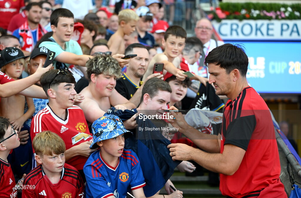 12 August 2026; Harry Maguire of Manchester United signs autographs before the pre-season friendly match between Manchester United and Leeds United at Croke Park in Dublin. Photo by Stephen McCarthy/Sportsfile