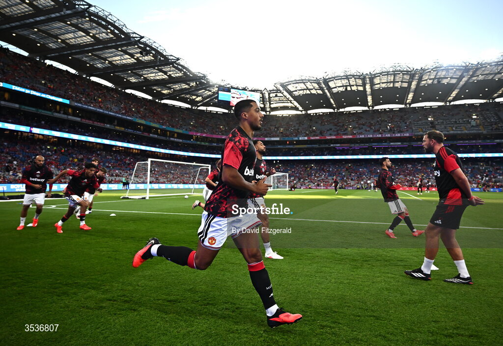 12 August 2026; Youri Tielemans of Manchester United and team mates warm up before the pre-season friendly match between Manchester United and Leeds United at Croke Park in Dublin. Photo by David Fitzgerald/Sportsfile