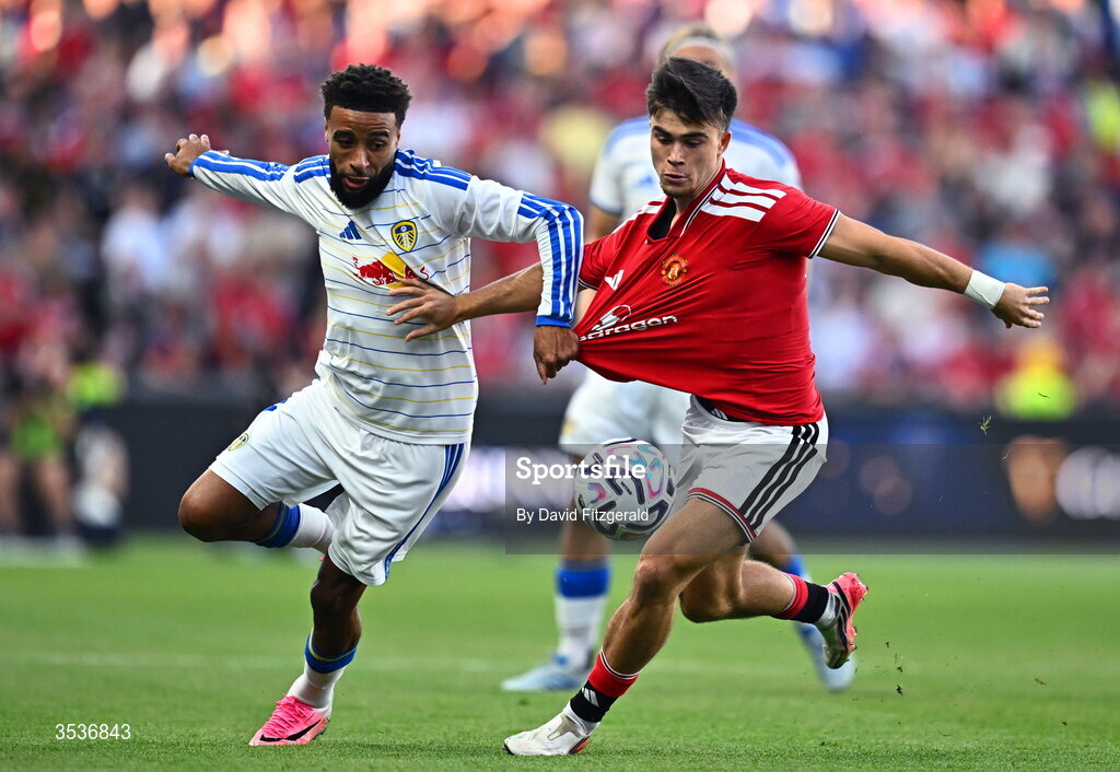 12 August 2026; Harry Amass of Manchester United in action against Jayden Bogle of Leeds United during the pre-season friendly match between Manchester United and Leeds United at Croke Park in Dublin. Photo by David Fitzgerald/Sportsfile