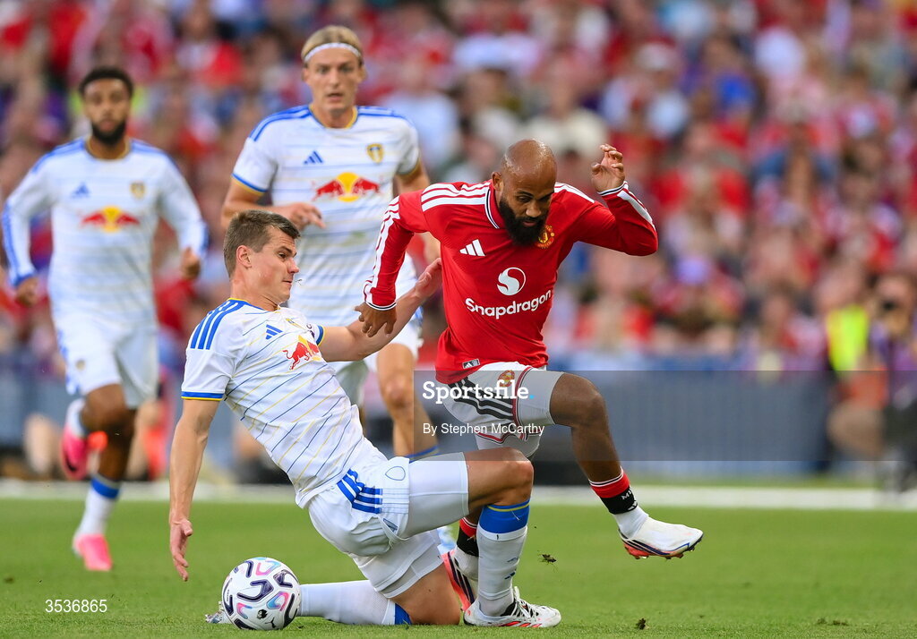 12 August 2026; Bryan Mbeumo of Manchester United in action against Jaka Bijol of Leeds United during the pre-season friendly match between Manchester United and Leeds United at Croke Park in Dublin. Photo by Stephen McCarthy/Sportsfile