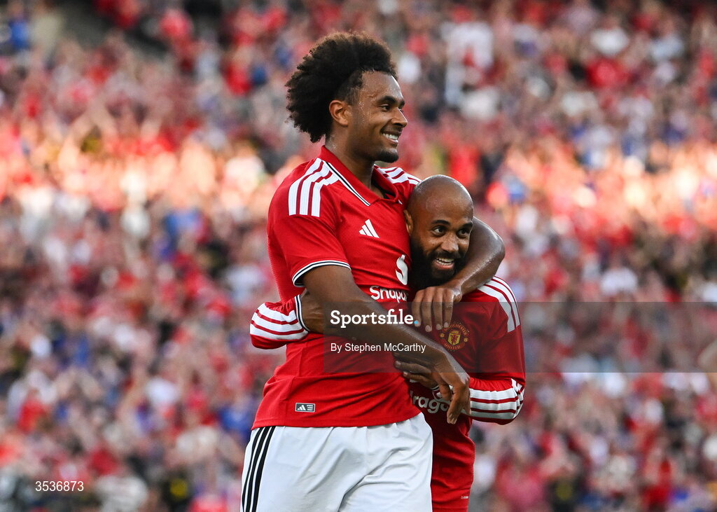 12 August 2026; Joshua Zirkzee of Manchester United celebrates with teammate Bryan Mbeumo, right, after scoring his side's first goal during the pre-season friendly match between Manchester United and Leeds United at Croke Park in Dublin. Photo by Stephen McCarthy/Sportsfile