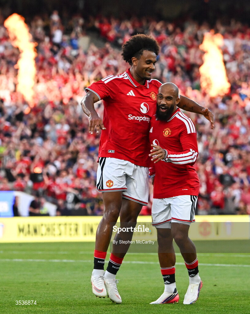 12 August 2026; Joshua Zirkzee of Manchester United celebrates with teammate Bryan Mbeumo, right, after scoring his side's first goal during the pre-season friendly match between Manchester United and Leeds United at Croke Park in Dublin. Photo by Stephen McCarthy/Sportsfile
