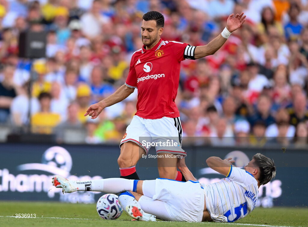 12 August 2026; Diogo Dalot of Manchester United in action against Tarik Muharemovic of Leeds United during the pre-season friendly match between Manchester United and Leeds United at Croke Park in Dublin. Photo by Stephen McCarthy/Sportsfile