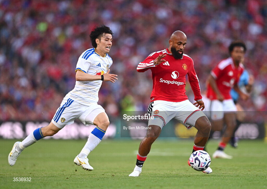 12 August 2026; Bryan Mbeumo of Manchester United in action against Ao Tanaka of Leeds United during the pre-season friendly match between Manchester United and Leeds United at Croke Park in Dublin. Photo by Ben McShane/Sportsfile