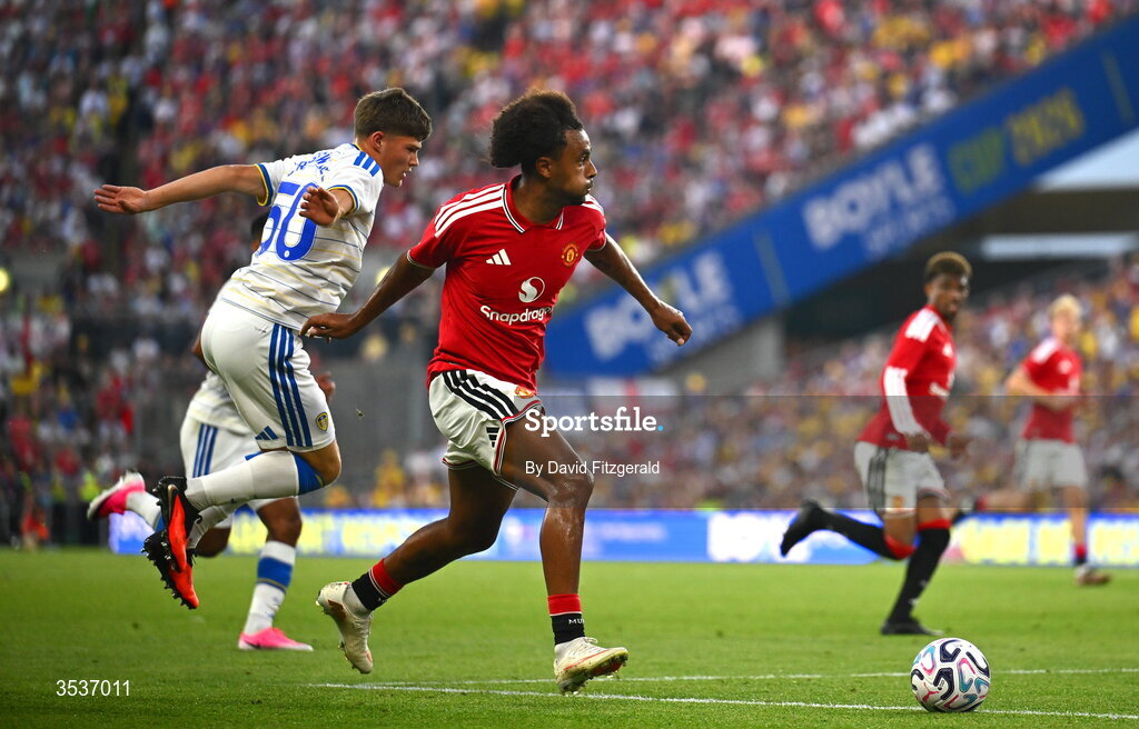 12 August 2026; Joshua Zirkzee of Manchester United in action against Alfie Cresswell of Leeds United during the pre-season friendly match between Manchester United and Leeds United at Croke Park in Dublin. Photo by David Fitzgerald/Sportsfile