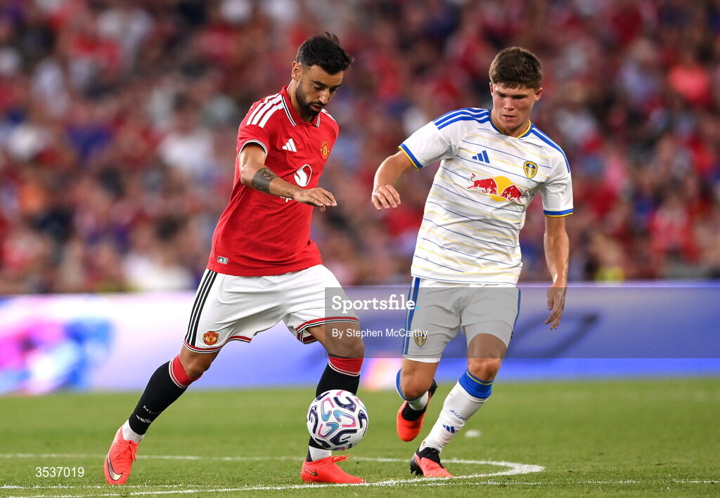 12 August 2026; Bruno Fernandes of Manchester United in action against Alfie Cresswell of Leeds United during the pre-season friendly match between Manchester United and Leeds United at Croke Park in Dublin. Photo by Stephen McCarthy/Sportsfile