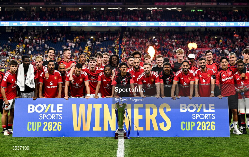 12 August 2026; Manchester United players celebrate with the trophy after their side's victory in the pre-season friendly match between Manchester United and Leeds United at Croke Park in Dublin. Photo by David Fitzgerald/Sportsfile