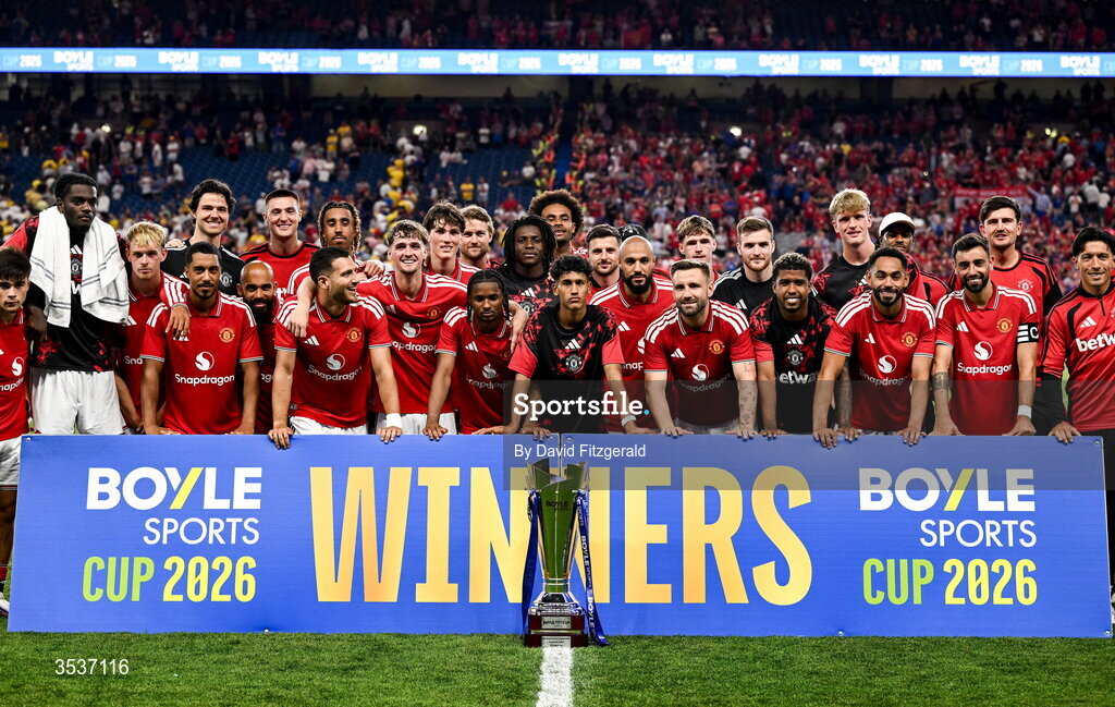 12 August 2026; Manchester United players celebrate with the trophy after their side's victory in the pre-season friendly match between Manchester United and Leeds United at Croke Park in Dublin. Photo by David Fitzgerald/Sportsfile