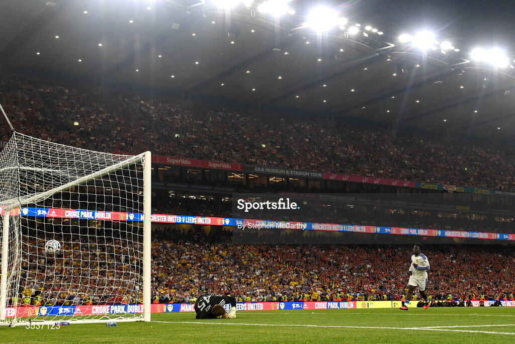 12 August 2026; Wilfried Gnonto of Leeds United scores a penalty past Manchester United goalkeeper Dermot Mee in the penalty shoot-out  during the pre-season friendly match between Manchester United and Leeds United at Croke Park in Dublin. Photo by Stephen McCarthy/Sportsfile