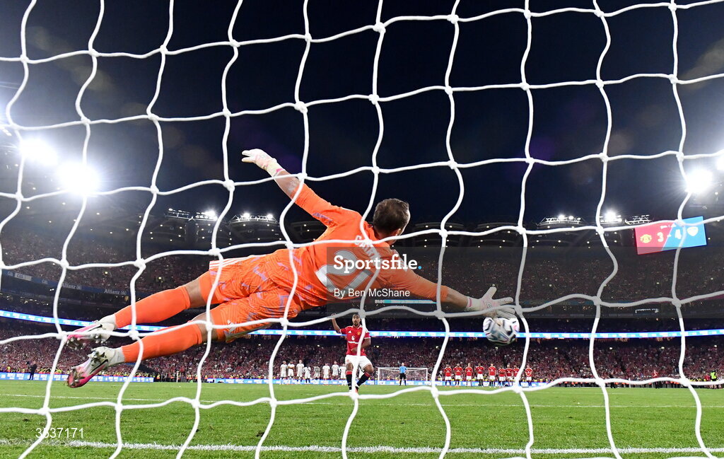12 August 2026; Youri Tielemans of Manchester United scores a penalty past Leeds United goalkeeper Alex Cairns in the penalty shootout during the pre-season friendly match between Manchester United and Leeds United at Croke Park in Dublin. Photo by Ben McShane/Sportsfile