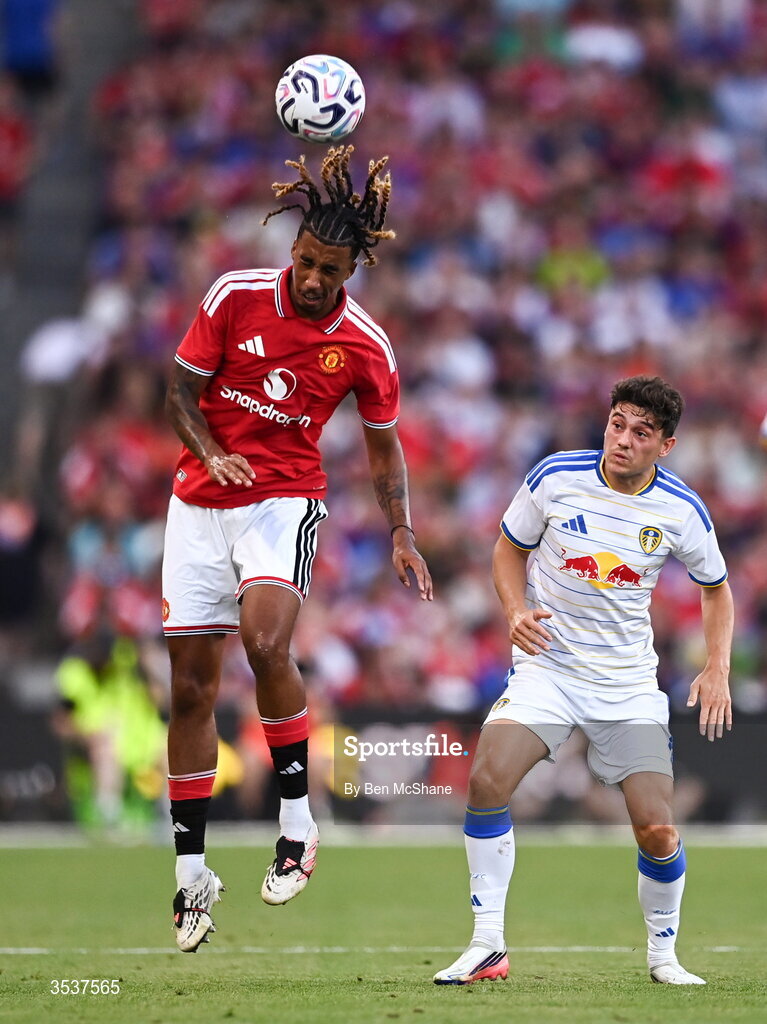 12 August 2026; Leny Yoro of Manchester United and Dan James of Leeds United during the pre-season friendly match between Manchester United and Leeds United at Croke Park in Dublin. Photo by Ben McShane/Sportsfile
