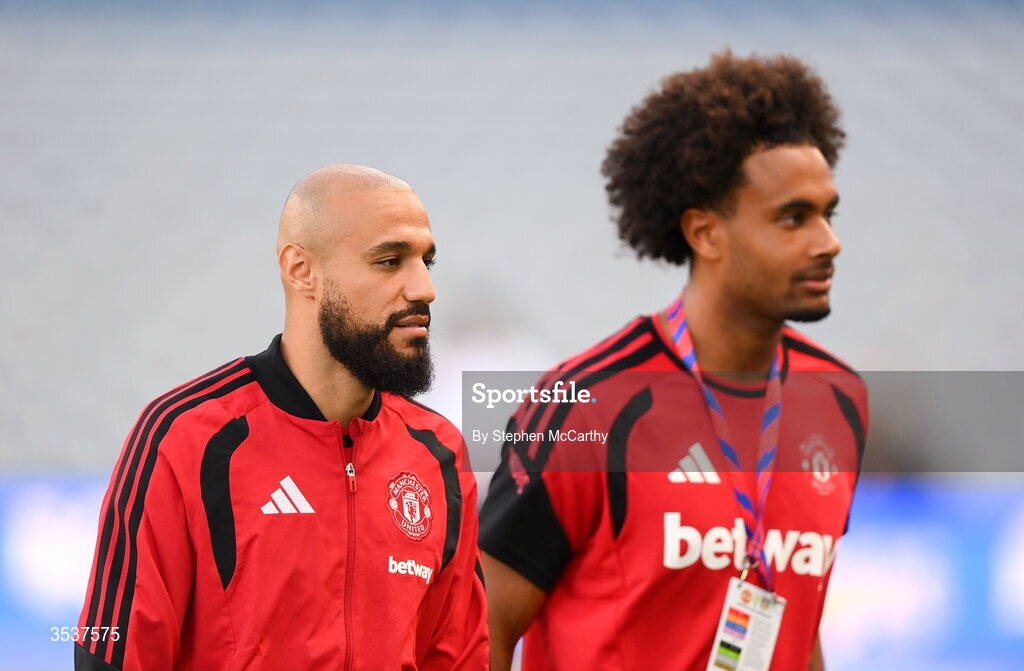 12 August 2026; Noussair Mazraoui, left, and Joshua Zirkzee of Manchester United before the pre-season friendly match between Manchester United and Leeds United at Croke Park in Dublin.