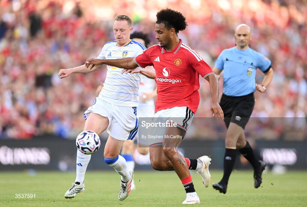12 August 2026; Joshua Zirkzee of Manchester United in action against Sean Longstaff of Leeds United during the pre-season friendly match between Manchester United and Leeds United at Croke Park in Dublin. Photo by Stephen McCarthy/Sportsfile