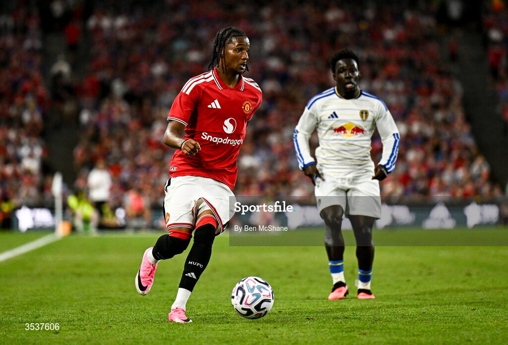 12 August 2026; Tynan Thompson of Manchester United and Wilfried Gnonto of Leeds United during the pre-season friendly match between Manchester United and Leeds United at Croke Park in Dublin. Photo by Ben McShane/Sportsfile