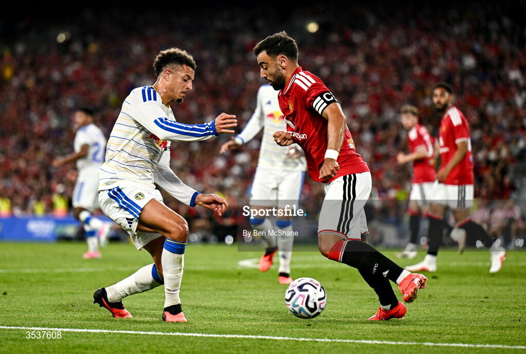 12 August 2026; Bruno Fernandes of Manchester United and Ethan Ampadu of Leeds United during the pre-season friendly match between Manchester United and Leeds United at Croke Park in Dublin. Photo by Ben McShane/Sportsfile