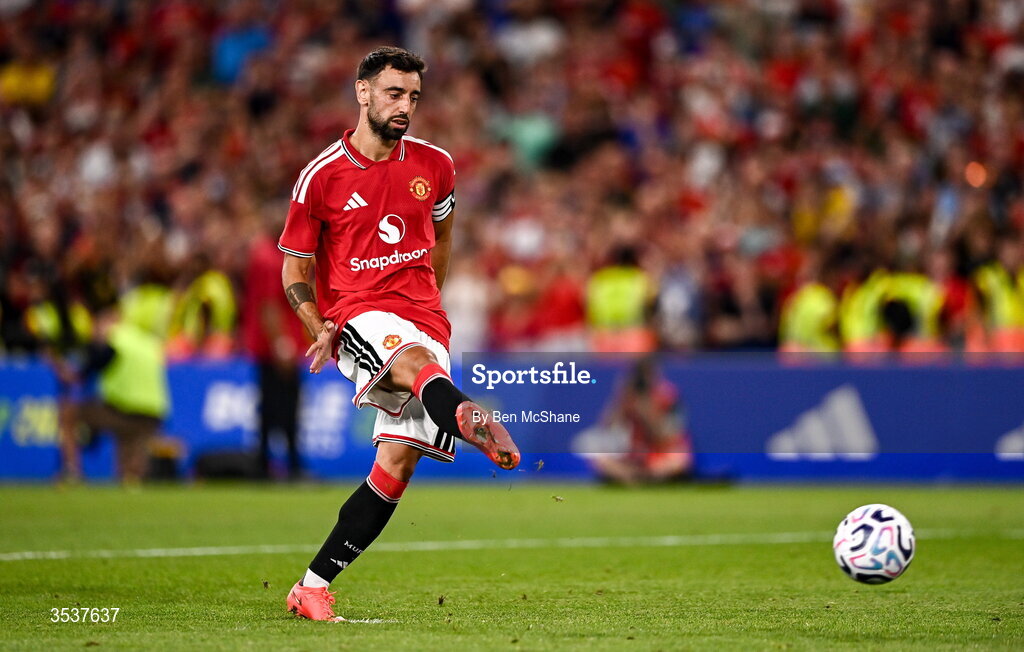 12 August 2026; Bruno Fernandes of Manchester United takes a penalty in the penalty shootout during the pre-season friendly match between Manchester United and Leeds United at Croke Park in Dublin. Photo by Ben McShane/Sportsfile