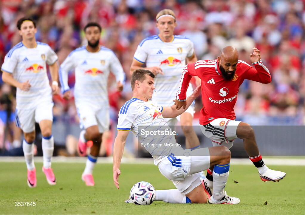 12 August 2026; Bryan Mbeumo of Manchester United in action against Jaka Bijol of Leeds United during the pre-season friendly match between Manchester United and Leeds United at Croke Park in Dublin.  Photo by Stephen McCarthy/Sportsfile