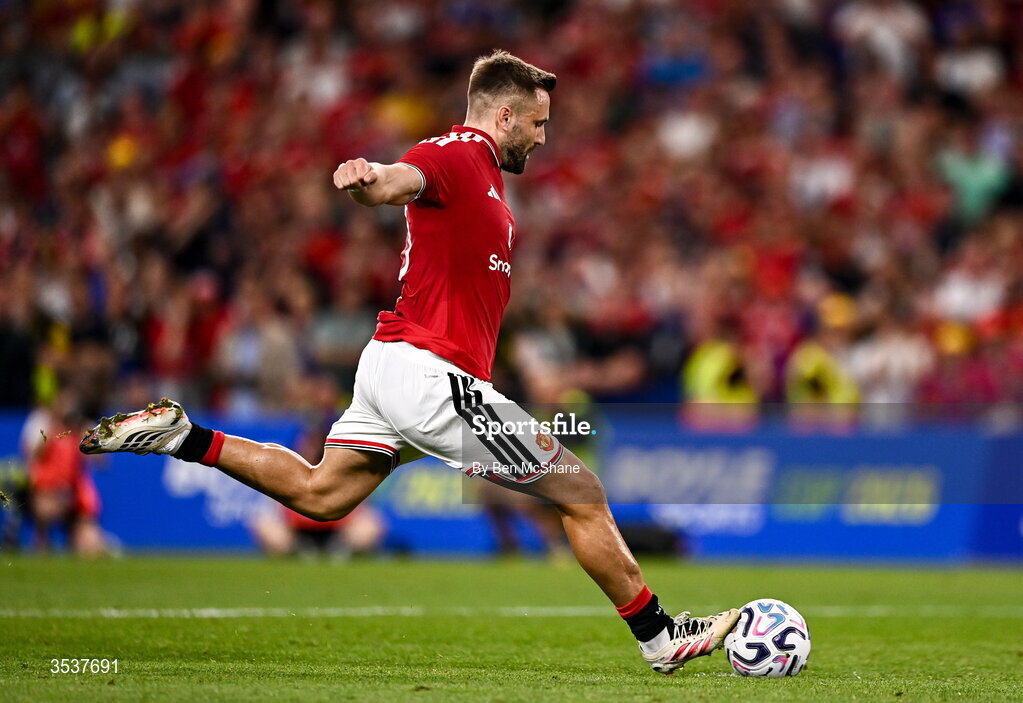 12 August 2026; Luke Shaw of Manchester United takes a penalty in the penalty shootout during the pre-season friendly match between Manchester United and Leeds United at Croke Park in Dublin. Photo by Ben McShane/Sportsfile