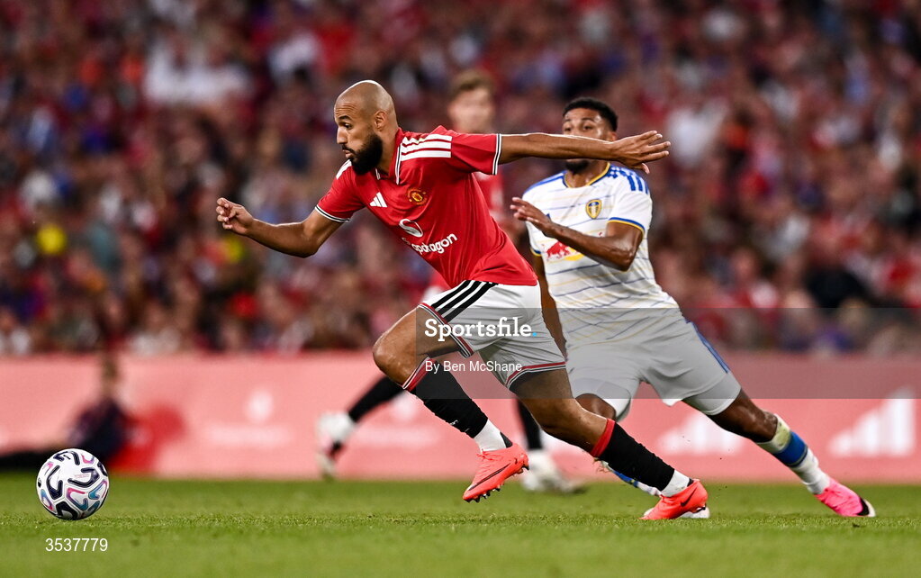 12 August 2026; Noussair Mazraoui of Manchester United and James Justin of Leeds United during the pre-season friendly match between Manchester United and Leeds United at Croke Park in Dublin. Photo by Ben McShane/Sportsfile