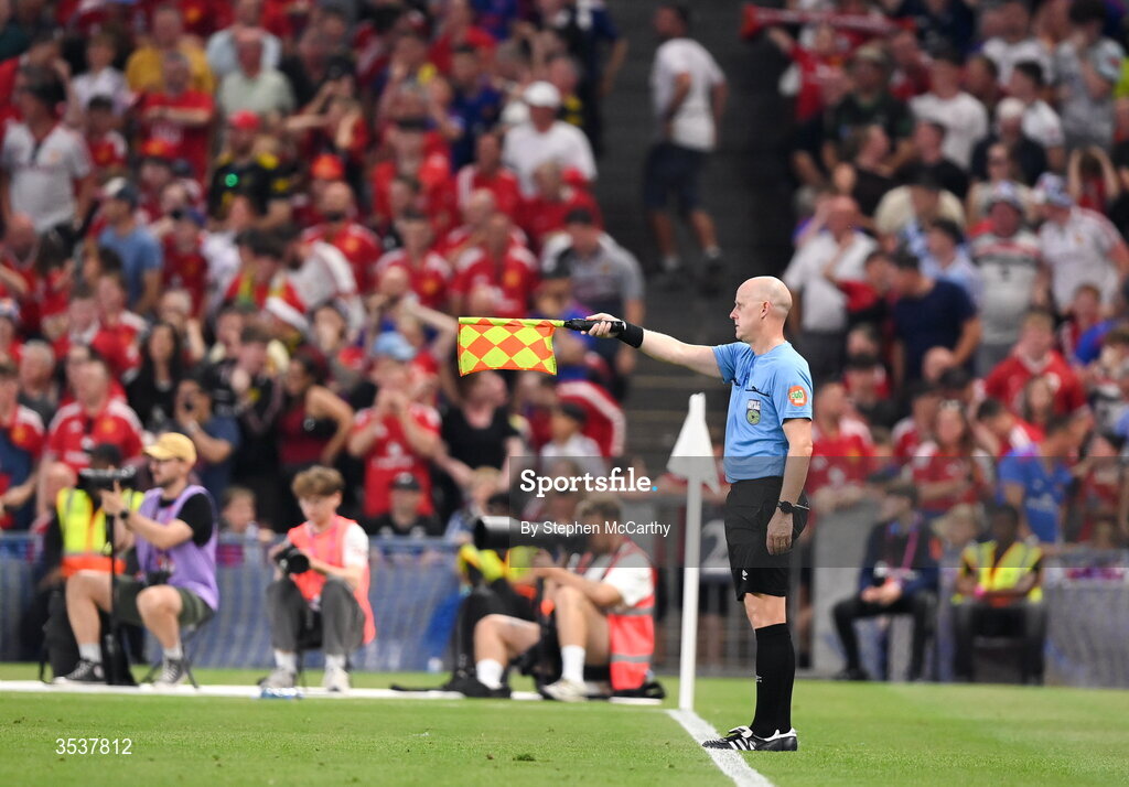 12 August 2026; Assistant referee Allen Lynch raises his flag for offside to rule out a goal by Bruno Fernandes of Manchester United during the pre-season friendly match between Manchester United and Leeds United at Croke Park in Dublin. Photo by Stephen McCarthy/Sportsfile
