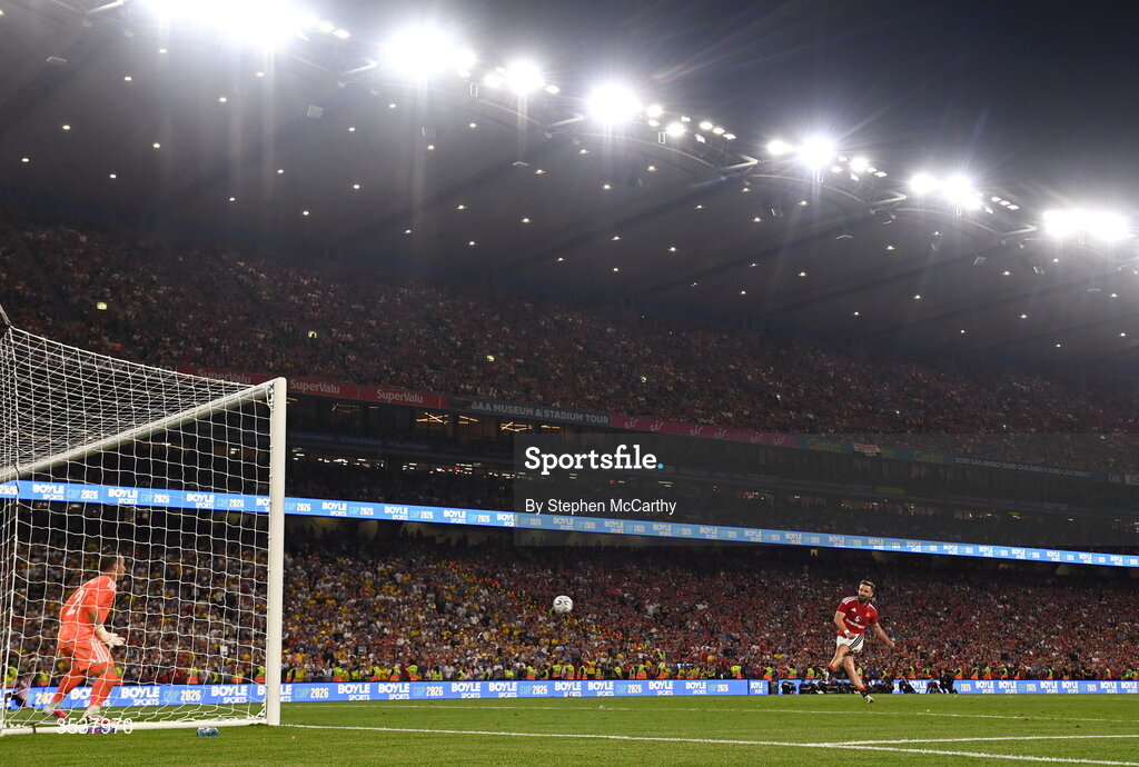 12 August 2026; Luke Shaw of Manchester United scores his penalty past Leeds United goalkeeper Alex Cairns during a penalty shootout at the end of the pre-season friendly match between Manchester United and Leeds United at Croke Park in Dublin. Photo by Stephen McCarthy/Sportsfile